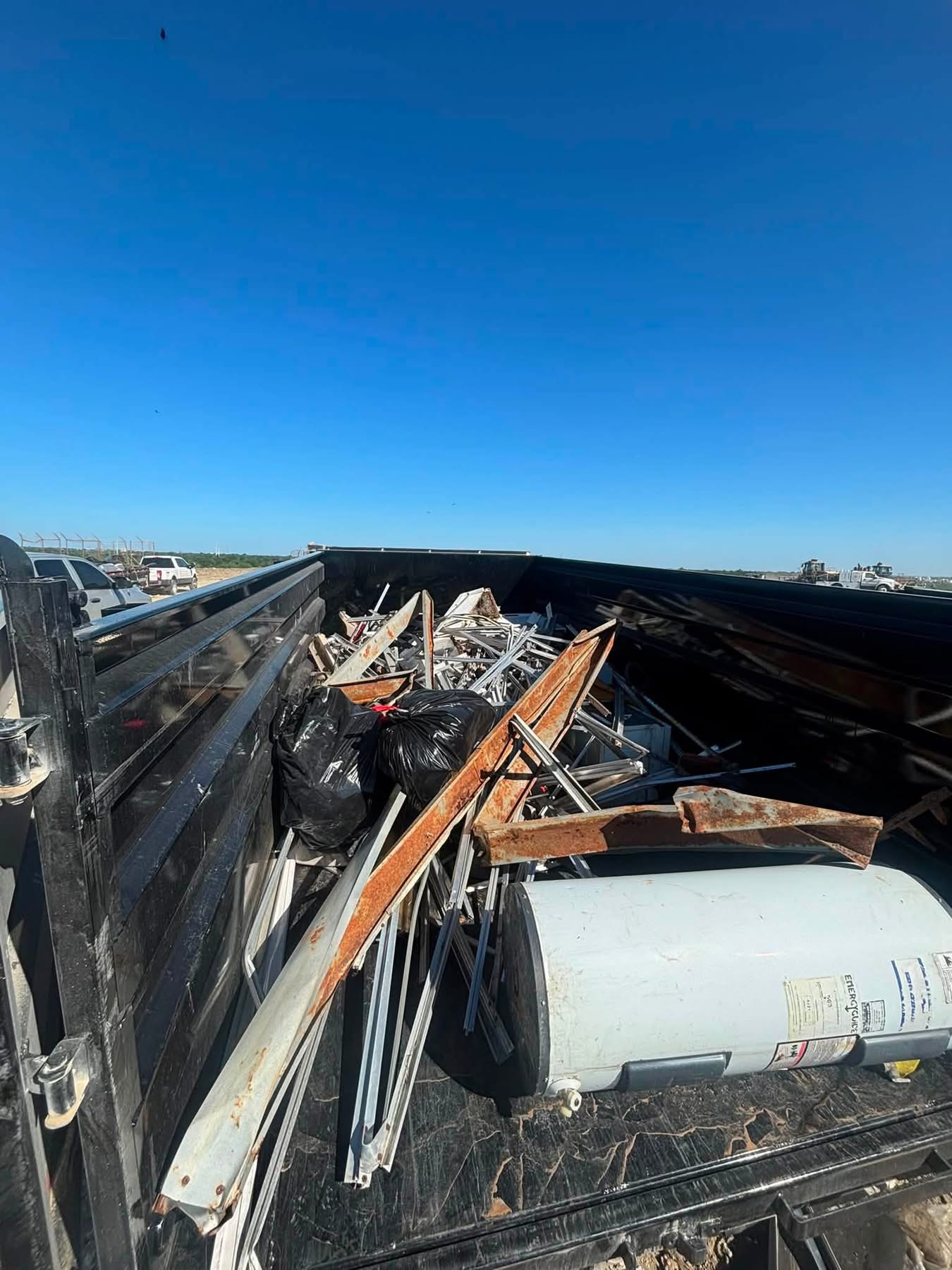 Construction debris inside dump trailer
