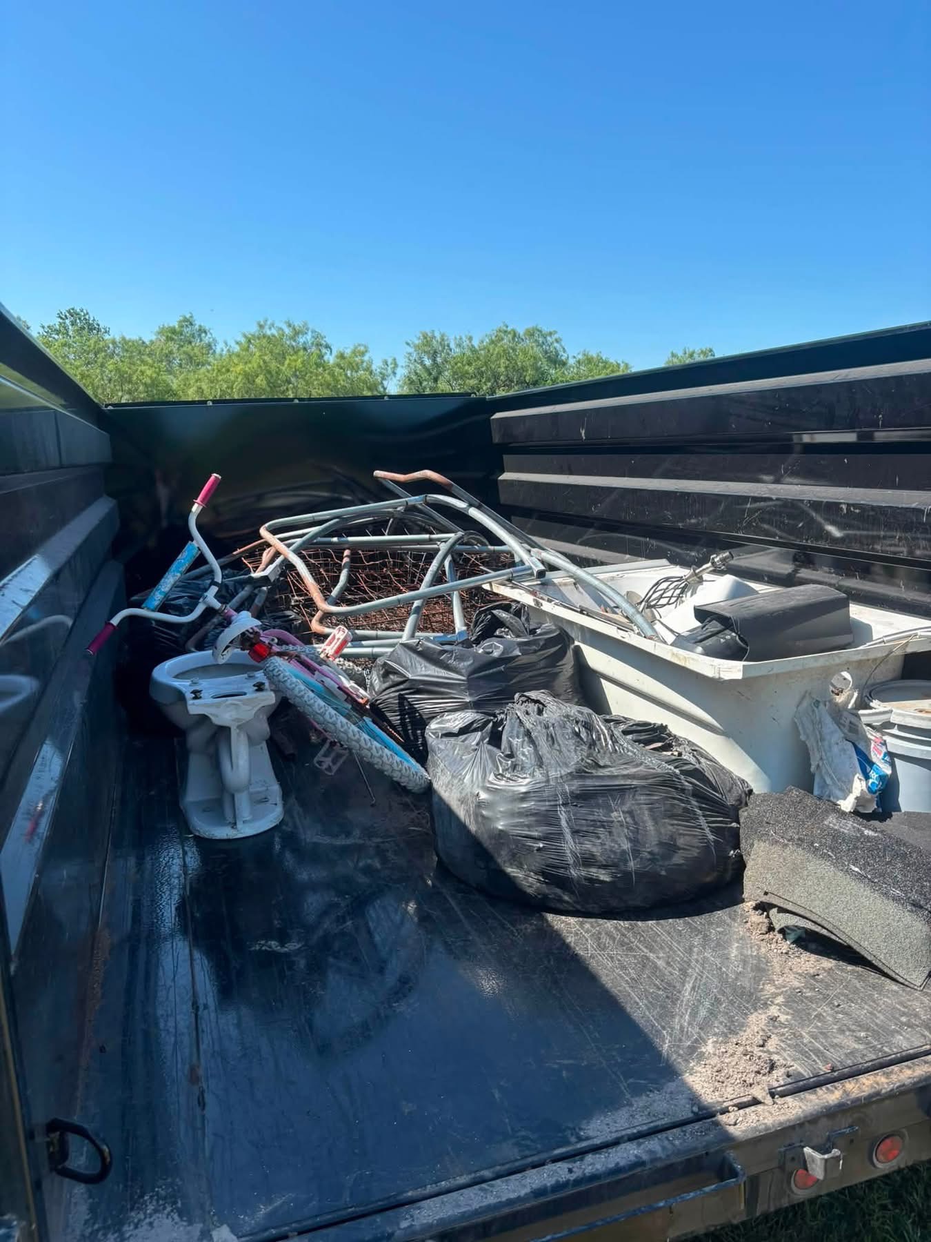 Household junk loaded into trailer